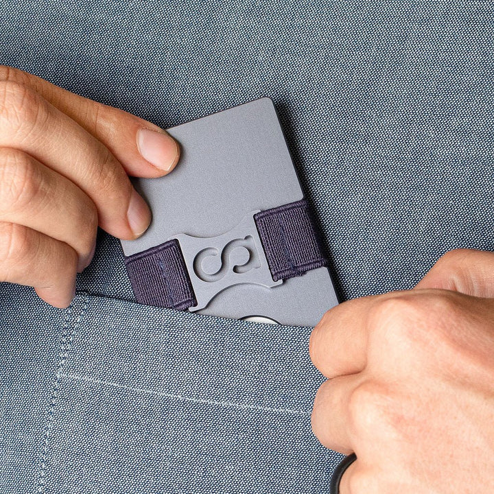 a person holding a cell phone in their hands